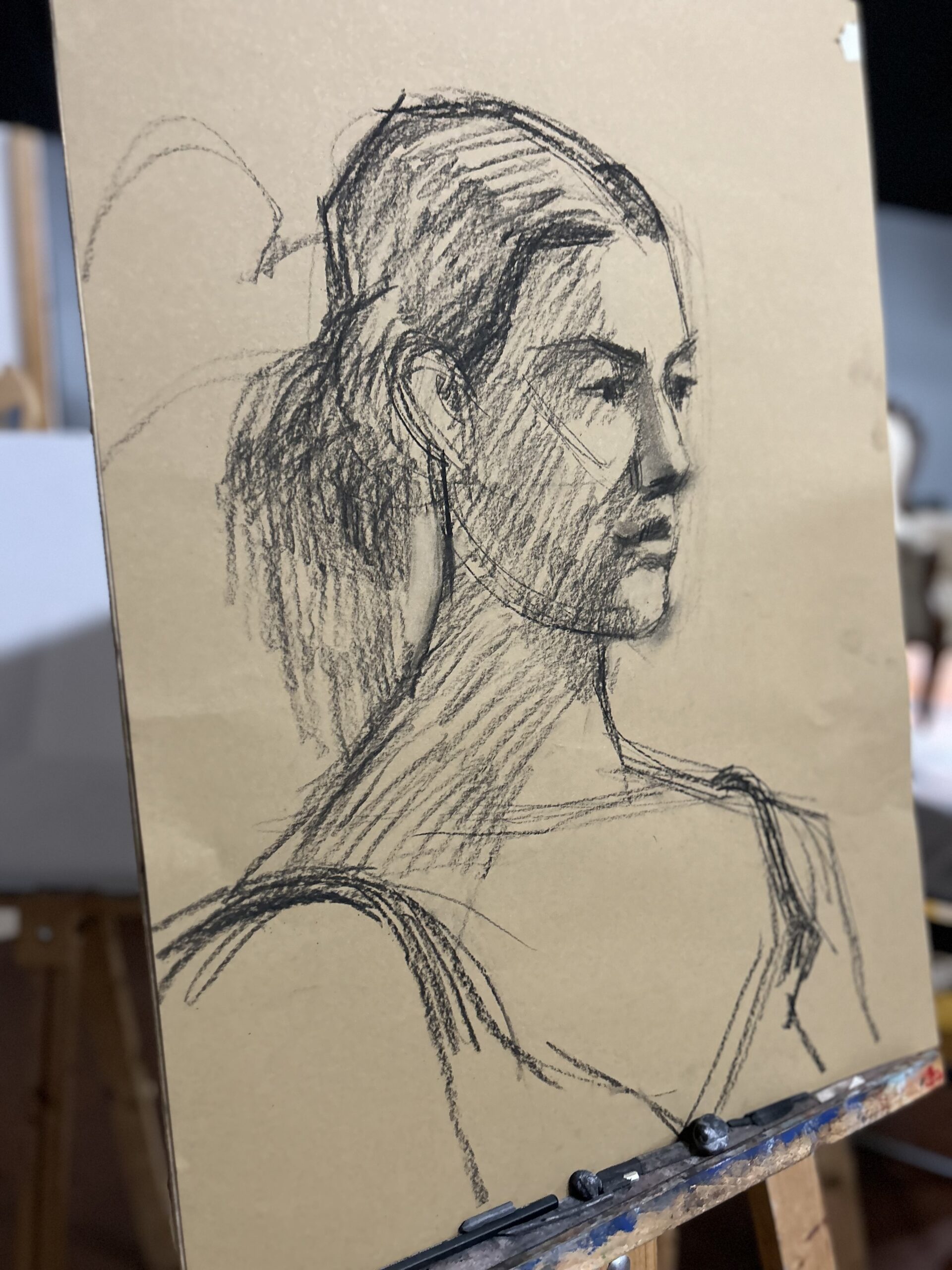 Live drawing with a model in a fixed pose.